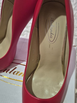 Red high heel pumps