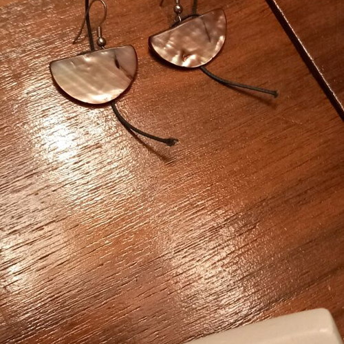 Earrings like new made of natural shell material