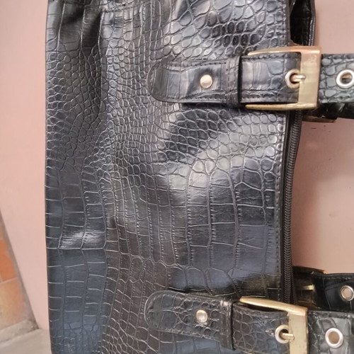 Vintage black women's shoulder bag with crocodile and snake texture, used