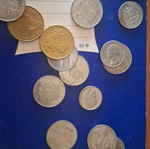 Mixed coins used, drachmas and Australian and American dollars