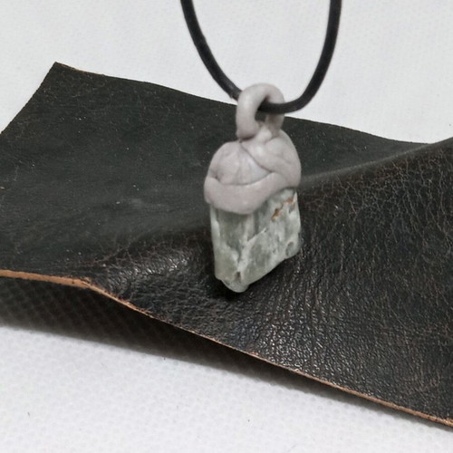 Pendant made of natural stone and polymer clay, tribal style