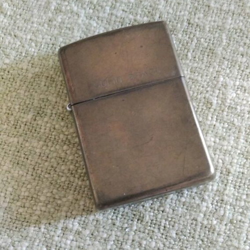 Zippo lighter collectible used, bronze color