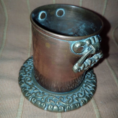 Copper cup used with embossed bronze base and handles
