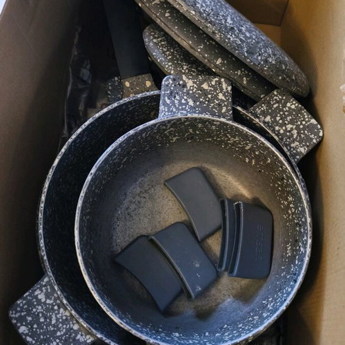 Heavy cookware set used with lids and large frying pan