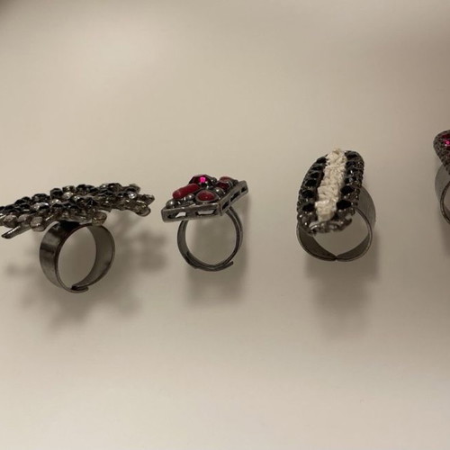 Set of 7 rings used with adjustable clasp