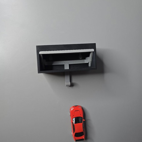 3D printed wall mount hanger with car display and lifting door
