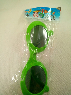 Carnival sunglasses green baby toys unused