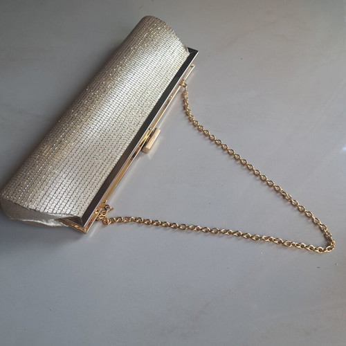 Clutch shoulder bag gold like new