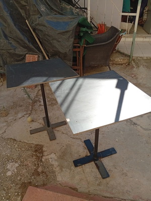 Outdoor tables with metal cross base, set of 2