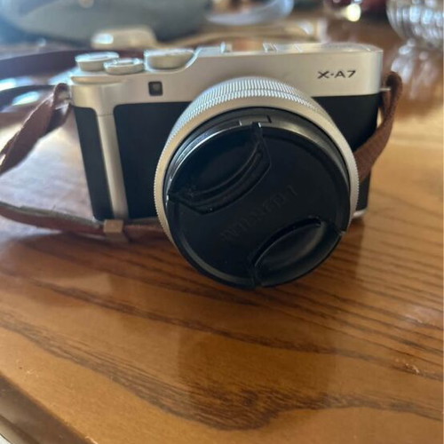 Fujifilm X-A7 mirrorless camera with XC15-45mm lens and accessories