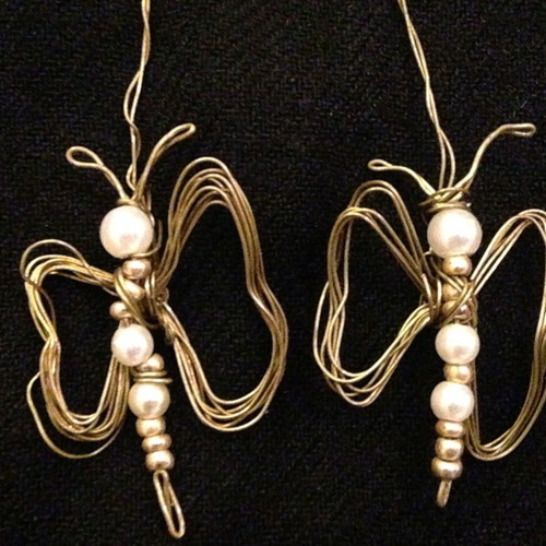 Brass earrings used, handmade butterfly design