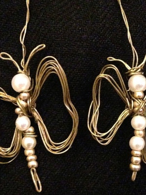 Brass earrings used, handmade butterfly design