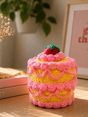 Χειροποίητη πλεκτή τούρτα amigurumi σε παστέλ ροζ και κίτρινο