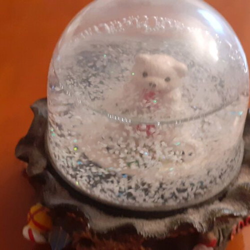 Glass globe with teddy bear like new