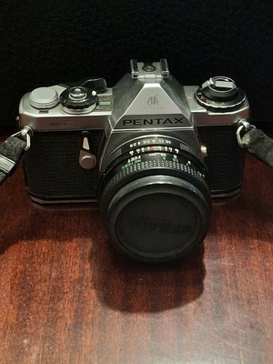 Vintage Asahi Pentax ME camera used with 2 lenses and AF 200S flash