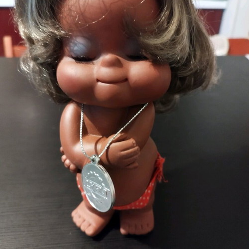 Lyra doll like new, 18cm tall, with company pendant mark