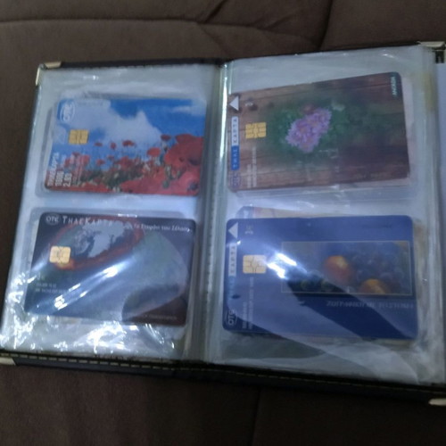 Collectible old phone cards with album used