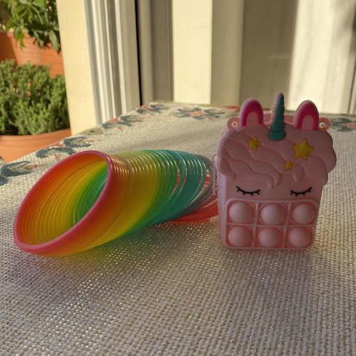 Girls' set with silicone wallet and slinky toy like new