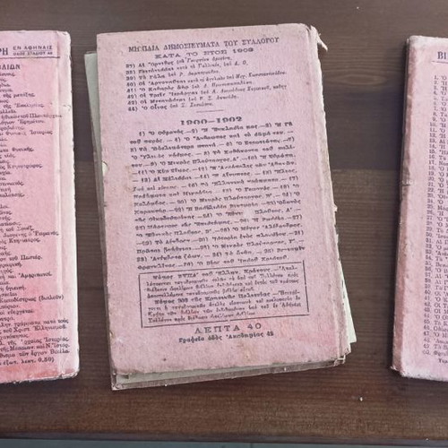 Books from early 20th century used, one cut in two