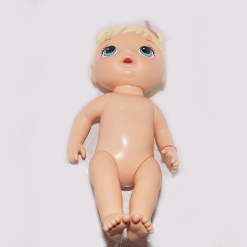 Girl doll used, hard plastic, size about 20 cm