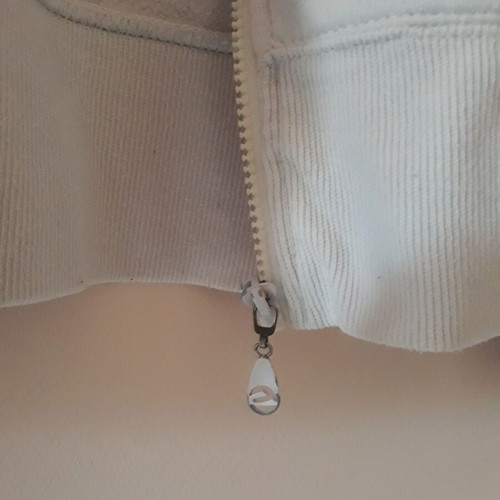 Caan sports jacket with hood used, small women's size