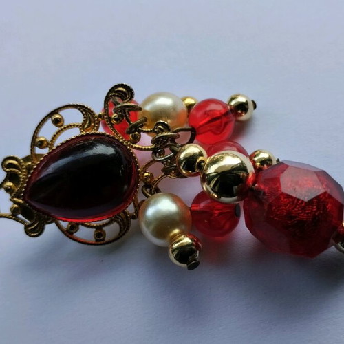 Button earrings used with red beads