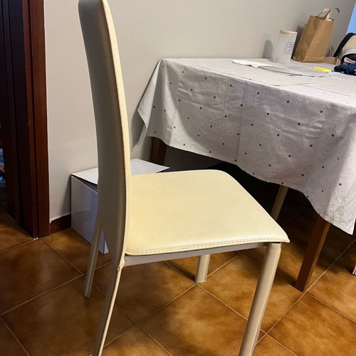 Chairs set of four used, ecru leatherette