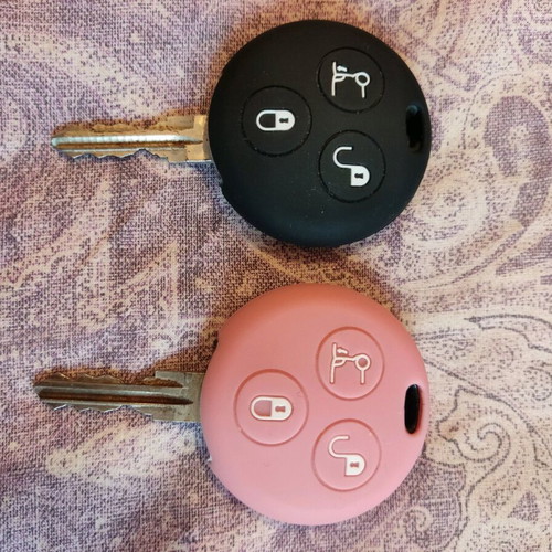 Smart for two silicone key covers like new, pink and black