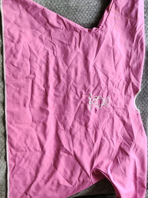 Babybjorn smock used for feeding or play pink fuchsia