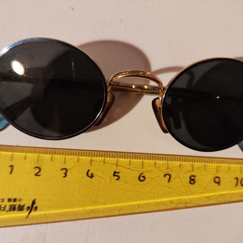 Vogue children's sunglasses like new, black and gold