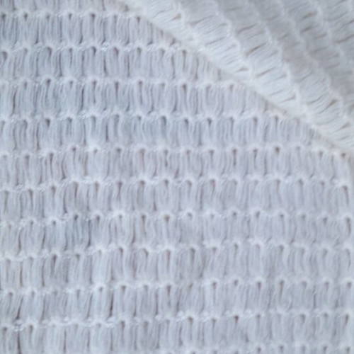 Knitted white scarf used with slight yellowing