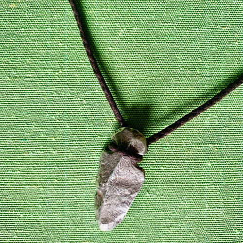 Men's silver 925 pendant like new with brown cord
