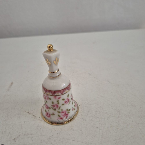 Porcelain decorative bell with floral design and gold details, new
