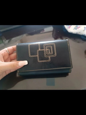 Vintage black leather wallet used with embroidery and multiple compartments