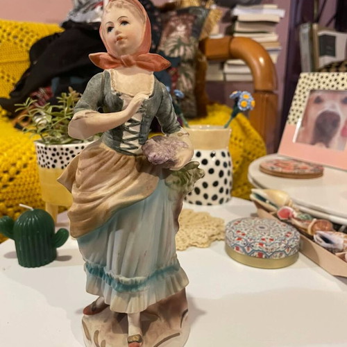Porcelain decorative figurine of a girl with matte finish like new