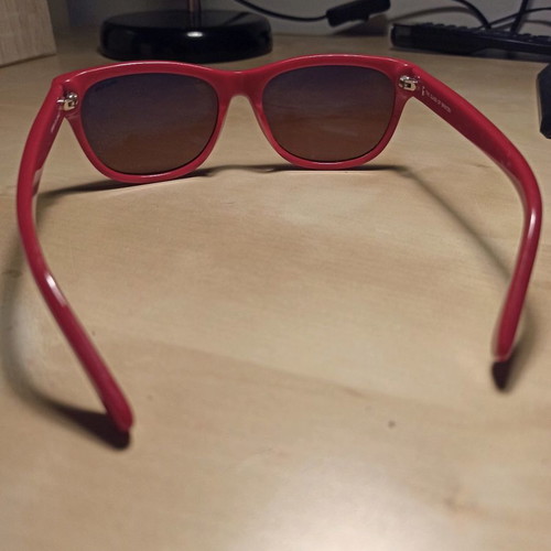 Brixton women's red sunglasses used with 100% UV protection