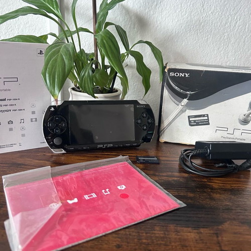 Sony PlayStation Portable PSP-1004 used with original box and accessories