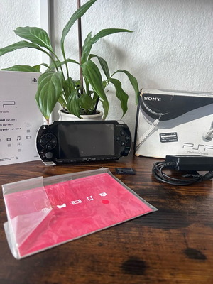Sony PlayStation Portable PSP-1004 used with original box and accessories