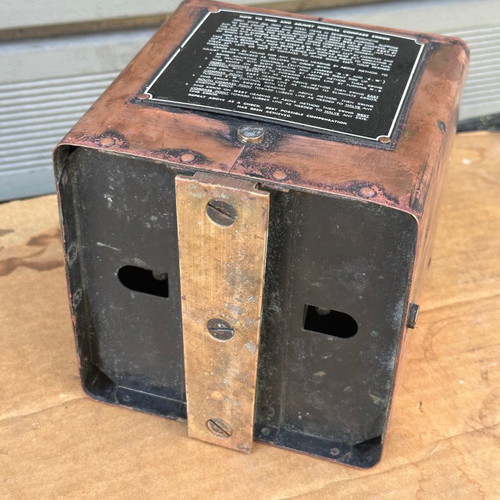 Old copper submarine compass used with artificial horizon