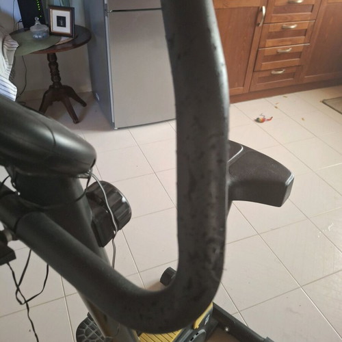 Static exercise bike used with signs of wear