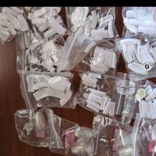 Nail art equipment used with tips, top coat, quickgel, and tools