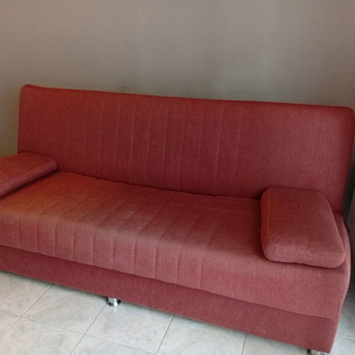 Three-seater sofa bed with storage space