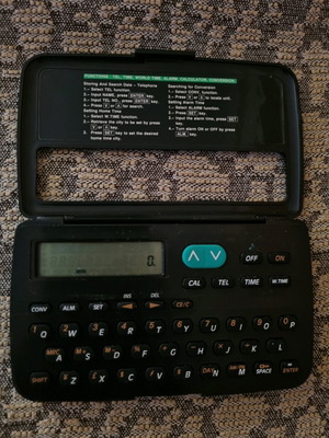Electronic organizer calculator like new with multiple functions