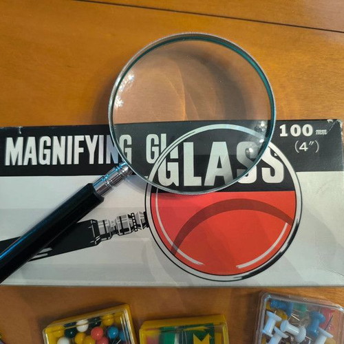Magnifying glass, scissors and boxes of pins new