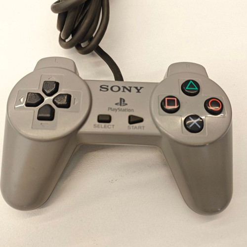 Sony PS1 with modchip used, with original controller and cables