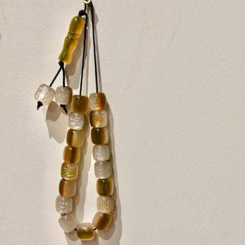 Two-tone worry beads in white and honey shades like new