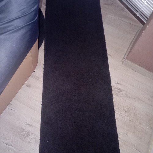 Black interior vintage runner rug used, minimalist design