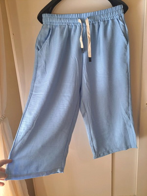 Light blue summer trousers like new, size L