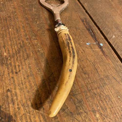 Vintage bottle opener used, height 16.5 cm