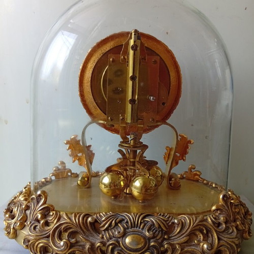 400-day mechanical clock with glass dome